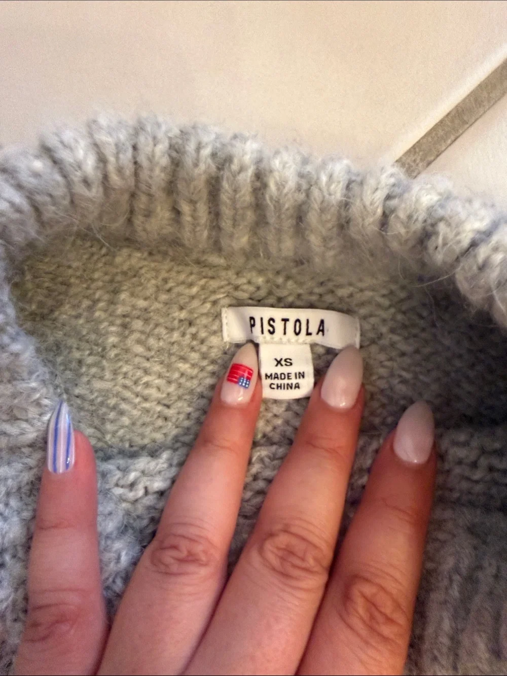 Pistola Mock Neck Sweater